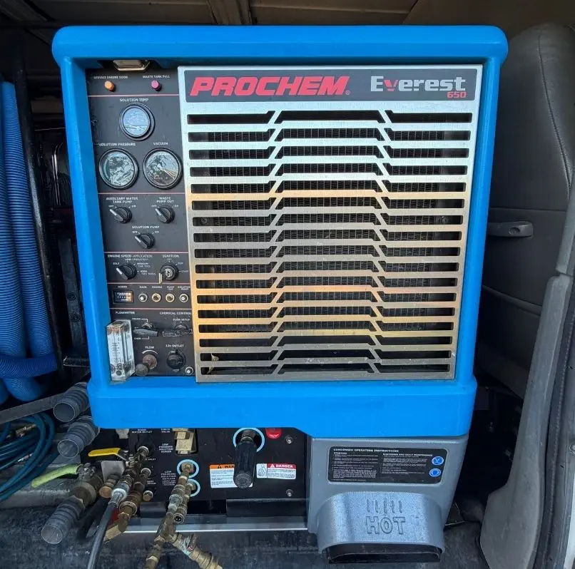 A powerful blue Prochem Everest 650 truck-mounted carpet cleaning machine inside a Wharton Carpet Cleaning van in Phoenix.