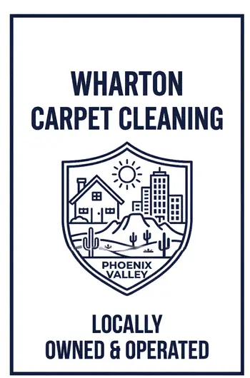 Locally Owned & Operated" trust badge for Wharton Carpet Cleaning, featuring a custom shield with a home, city buildings, and a desert landscape representing the Phoenix Valley.